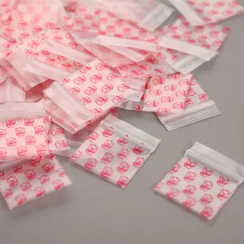100 бр мини-самоуплотняющихся найлонови торбички с цип 22 мм * 33 mm, прозрачна опаковъчен пакет с шарени Розово прасе - Изображение 1  