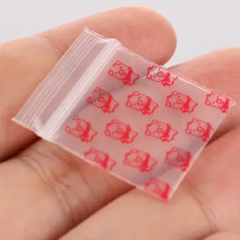 100 бр мини-самоуплотняющихся найлонови торбички с цип 22 мм * 33 mm, прозрачна опаковъчен пакет с шарени Розово прасе - Изображение 2  